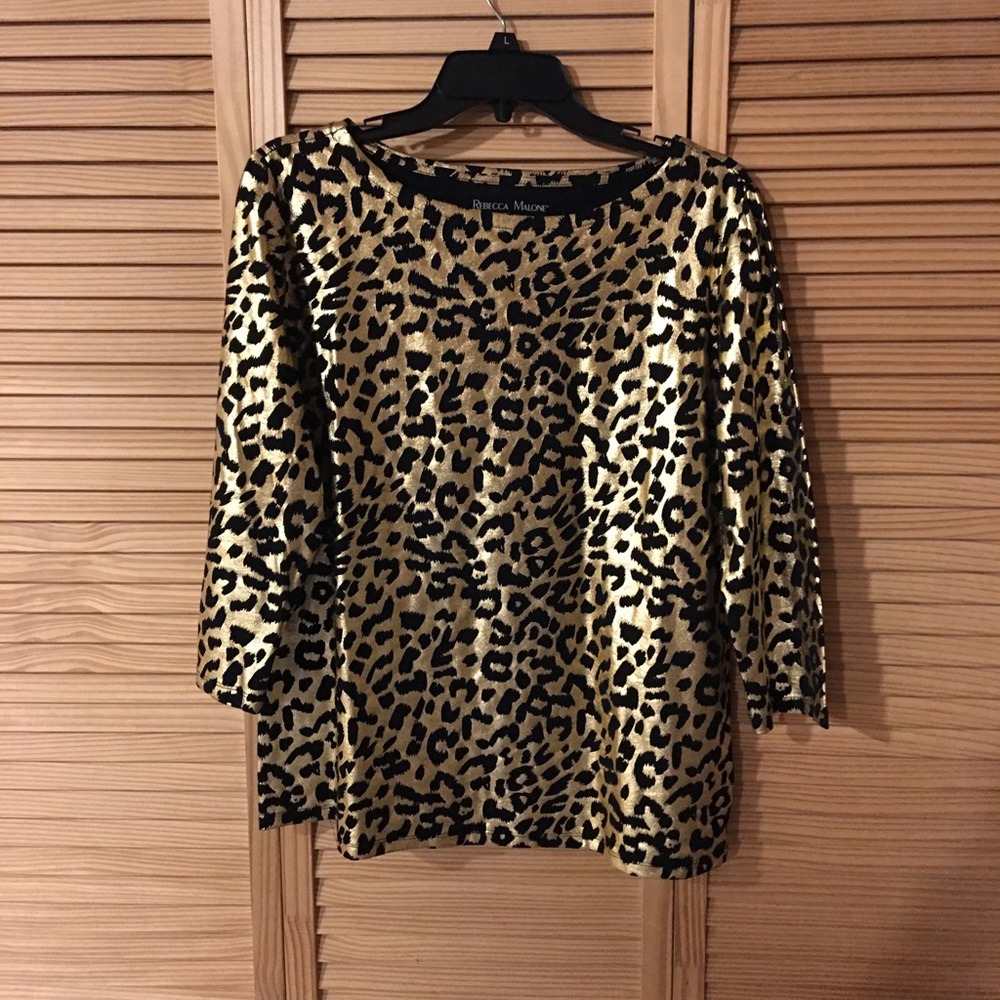 Rebecca Malone-Dress up any outfit with this top.